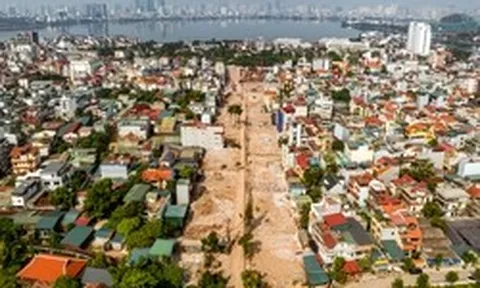 Hình hài đường dẫn cầu Tứ Liên dần hiện rõ bên bờ sông Hồng